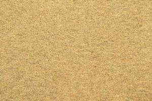 une beige en tissu Contexte texture plein Cadre photo