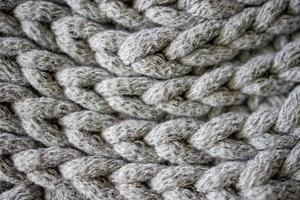 intéressant Contexte fabriqué de crochet Fait main, gris coton corde photo