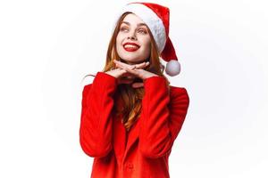 jolie femme dans Père Noël costume posant mode luxe photo