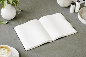 moquer en haut de un ouvert livre sur une moderne minimaliste tableau. 3d rendre photo
