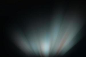 arc en ciel bokeh prisme arc en ciel lumière fusées éclairantes recouvrir sur noir Contexte photo