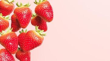 fraises tombantes avec fond rouge et espace pour le texte, illustration 3d photo