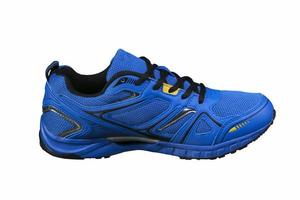 bleu baskets avec Jaune accents isolé. des sports chaussures. photo