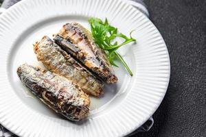 poisson sardine en conserve Fruit de mer repas nourriture casse-croûte sur le table copie espace nourriture Contexte rustique Haut vue photo