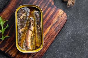 poisson sardine en conserve Fruit de mer repas nourriture casse-croûte sur le table copie espace nourriture Contexte rustique Haut vue photo