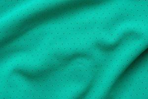 tissu de vêtements de sport vert maillot de football fond de texture de maillot photo