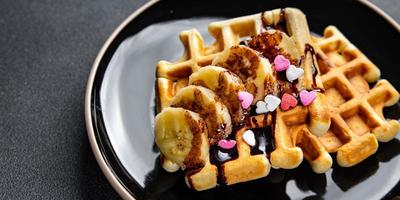 gaufres Belge ou américain gaufres petit déjeuner ou sucré dessert repas nourriture casse-croûte sur le table copie espace nourriture Contexte rustique Haut vue photo