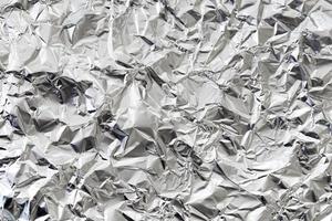 Fond de papier d'aluminium argenté froissé photo