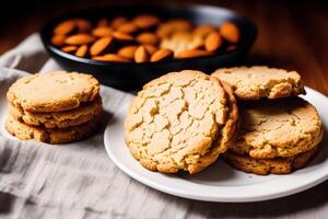 fait maison flocons d'avoine biscuits avec amandes sur une en bois Contexte. génératif ai photo