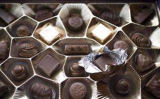 boîte de des chocolats sucré Contexte photo