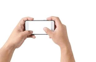 deux mains en portant intelligent téléphone avec Vide blanc écran photo