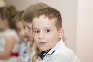 portrait de une enfant d'âge préscolaire garçon de Jardin d'enfants. photo