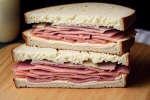 sandwich avec jambon, fromage et salade sur une blanc plaque. sandwich avec thon et des légumes. génératif ai photo