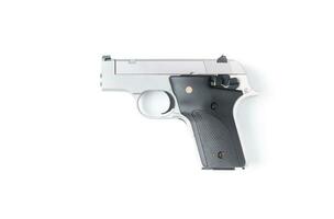 petit automatique pistolet isolé sur blanc Contexte photo