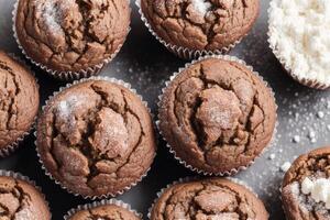 fait maison muffins avec cannelle et amandes sur une noir Contexte. génératif ai photo