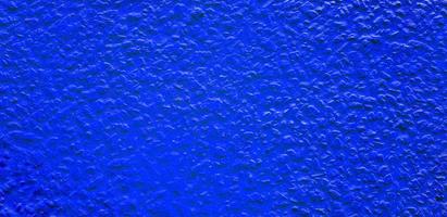 rugueux ou grunge bleu peint béton ou ciment mur pour Contexte. rétro fond d'écran, coloré, La peinture et texture de surface concept. photo