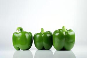 une groupe de vert cloche poivre isolé sur blanc Contexte. ai généré photo