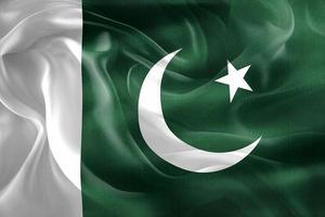 Illustration 3d d'un drapeau pakistanais - drapeau en tissu ondulant réaliste photo