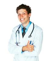 portrait de une souriant Masculin médecin avec doigt en haut sur blanc photo