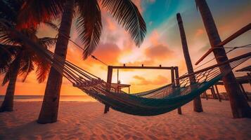 hamac sur le plage à le coucher du soleil. tropical vacances avec tout compris. ai généré. photo