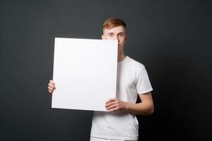 ai génératif une homme détient une Vide blanc signe planche maquette dans le sien main photo