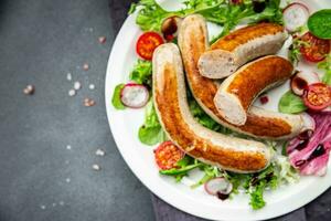 saucisses frit Viande en bonne santé repas nourriture casse-croûte sur le table copie espace nourriture Contexte rustique Haut vue photo