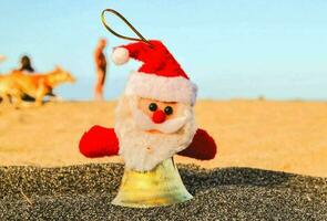 Père Noël décoration sur le le sable photo