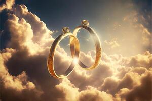 une paire de or mariage anneaux flottant dans le ciel. deux mariage anneaux flottant dans le des nuages avec une Soleil dans le Contexte et une bleu ciel avec des nuages au dessous de eux. génératif ai. mariage concept. photo