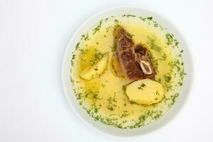 traditionnel colombien du boeuf nervure bouillon isolé sur blanc Contexte photo