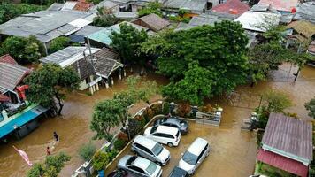 aérien pov vue représentation de inondation. dévastation forgé après massif Naturel désastres à bekasi - Indonésie photo