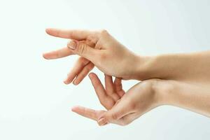 femelle mains doigt massage peau se soucier santé proche en haut photo