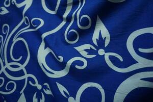 brillant bleu Contexte avec batik ornements tel comme fleurs photo