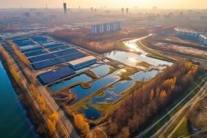 aérien vue de moderne industriel eaux usées traitement plante à le coucher du soleil illustration génératif ai photo