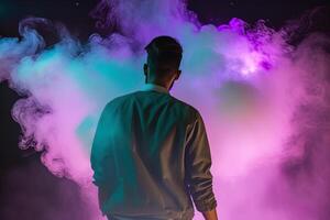 une homme permanent dans de face de une nuage de fumée avec néon lumières. ai généré photo