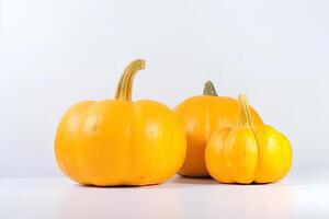 une groupe de Frais Orange citrouilles est isolé sur blanc Contexte. ai généré photo