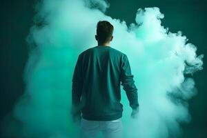 une homme permanent dans de face de une nuage de fumée avec le cyan thème. ai généré photo