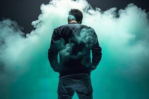 une homme permanent dans de face de une nuage de fumée avec le cyan thème. ai généré photo