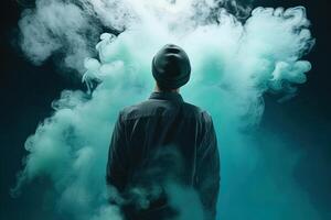 une homme permanent dans de face de une nuage de fumée avec le cyan thème. ai généré photo