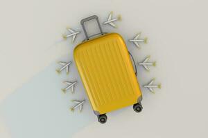 Voyage vacances concept avec Jaune valise et avion photo