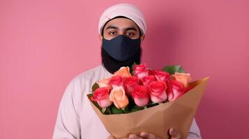 tondu image de Indien homme portant masque et en portant des roses bouquet sur rose Contexte. génératif ai. photo