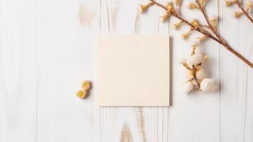 Vide invitation carte papier maquette et gypsophile fleur branche sur blanc en bois table haut, génératif ai. photo