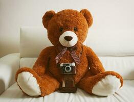nounours ours avec ancien 35mm caméra photo