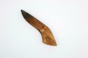 le côté angle de un indonésien pilon ou pétrir à moudre épices dans une cobek ou broyeur lequel est fabriqué de bois. photo