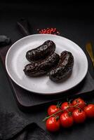 délicieux noir du sang saucisse ou noir pudding avec épices et herbes photo