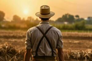 agriculteur homme lever du soleil ferme champ. produire ai photo