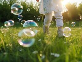 une proche en haut de géant bulles, flou Contexte de une enfant bokeh jambes portant blanc vêtements et fonctionnement autour sur le pelouse. ai génératif photo