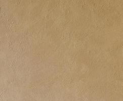 Mur de maison en plâtre rugueux beige clair comme arrière-plan