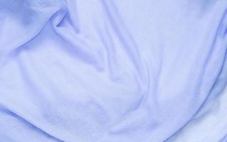 tissu bleu délicat, doux et froissé