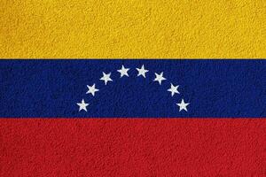 drapeau de le Venezuela sur une texturé Contexte. concept collage. photo