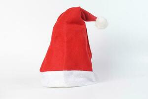 rouge Noël chapeau sur blanc Contexte photo